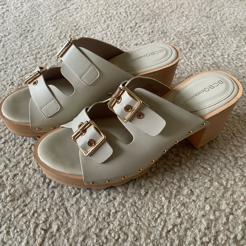 BCBGeneration Women's Cream and Tan Buckle Mules